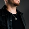 SP-Model-40 BigBlackMaria one of a kind skull necklace on male model.