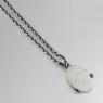 Solid Traditional Silver STS PE031 silver cross necklace with turquoise back view.